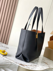 LOW KEY CABAS 47 IN BLACK GRAINED CALFSKIN GOLD BUCKLE