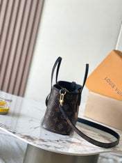 NEVERFULL BANDOULIÈRE INSIDE OUT BB 24 IN BROWN MONOGRAM CANVAS AND BLACK CALFSKIN