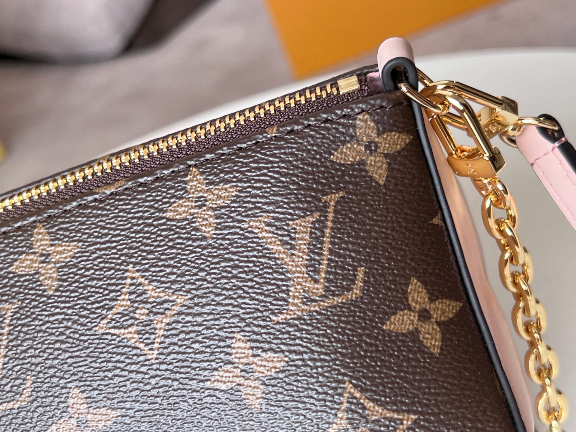 BLOOM POUCH 22 IN BROWN MONOGRAM CANVAS AND PASTEL PINK CALFSKIN SIDES