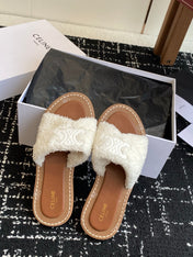 CELINE 26S TRIOMPHE FLAT SLIDES IN WHITE WOOL