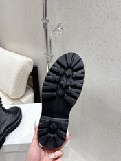 CELINE 26S CHUNKY-SOLE COMBAT BOOTS IN BLACK CALFSKIN