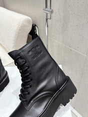 CELINE 26S CHUNKY-SOLE COMBAT BOOTS IN BLACK CALFSKIN