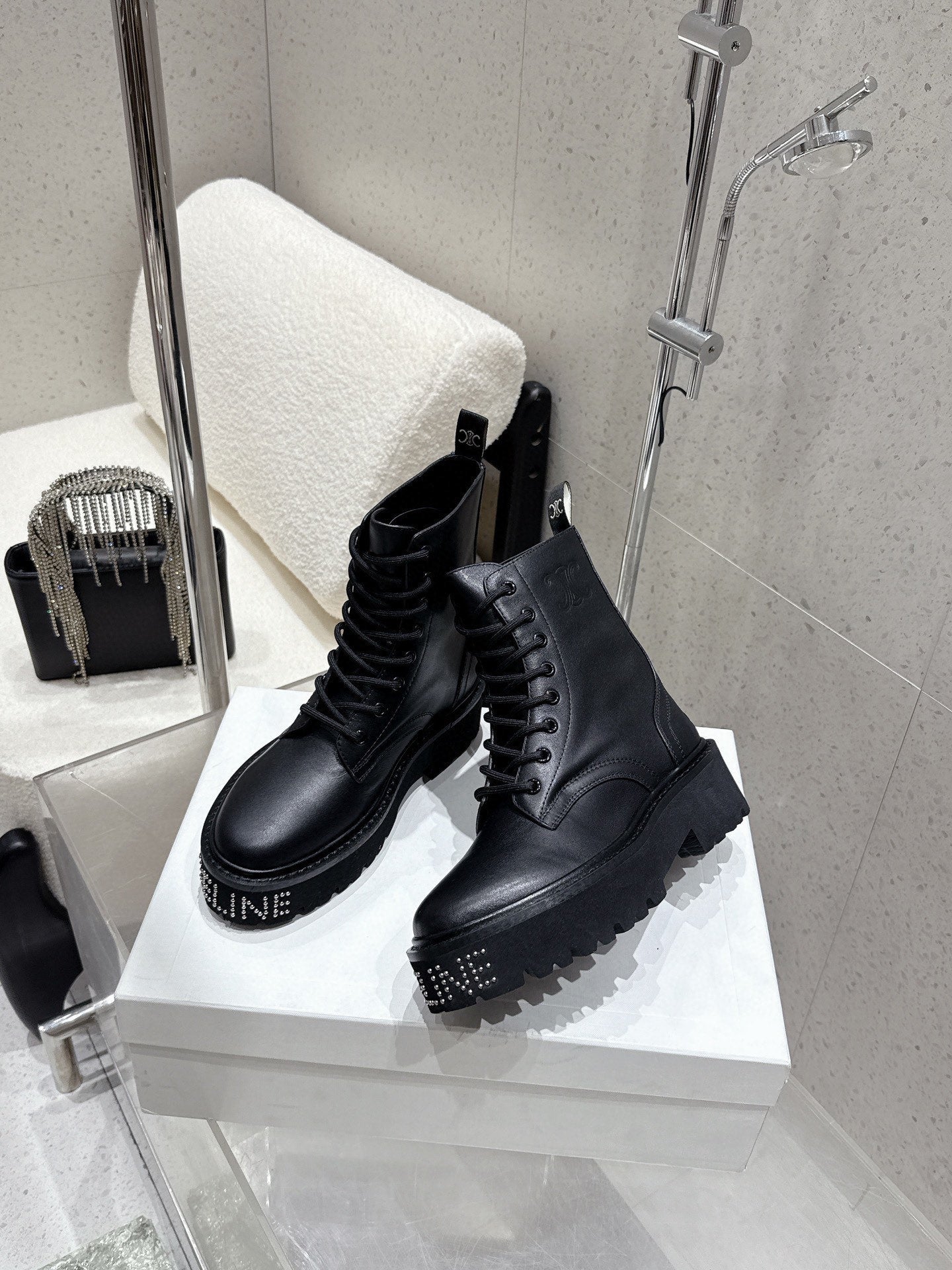 CELINE 26S CHUNKY-SOLE COMBAT BOOTS IN BLACK CALFSKIN