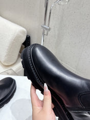 CELINE 26S ZIP-UP ANKLE BOOTS IN BLACK CALFSKIN