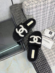 CHANEL 26S SLIDE SANDALS  IN BLACK AND WHITE SHEARLING OPEN TOE