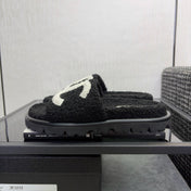 CHANEL 26S SLIDE SANDALS  IN BLACK AND WHITE SHEARLING OPEN TOE