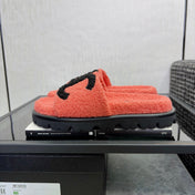 CHANEL 26S SLIDE SANDALS IN BLACK AND CORAL PINK SHEARLING OPEN TOE