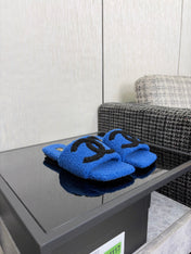 CHANEL 26S SLIDE SANDALS IN BLACK AND BLUE SHEARLING SQUARE TOE