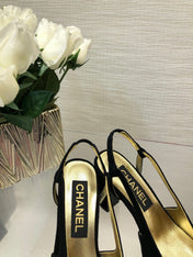HIGH SLINGBACKS IN BLACK SUEDE AND GOLDEN LAMBSKIN
