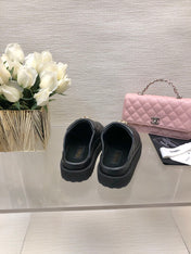 CC TURNLOCK FLAP MULES BLACK LAMBSKIN