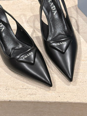PRADA 26S POINTED-TOE SLINGBACK HEELS 75MM IN BLACK SHINY CALFSKIN