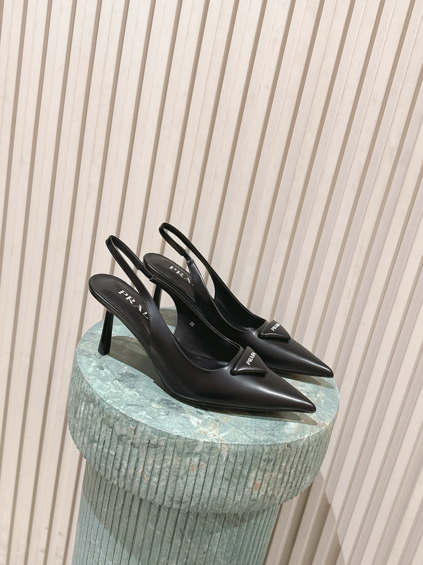 PRADA 26S POINTED-TOE SLINGBACK HEELS 75MM IN BLACK SHINY CALFSKIN