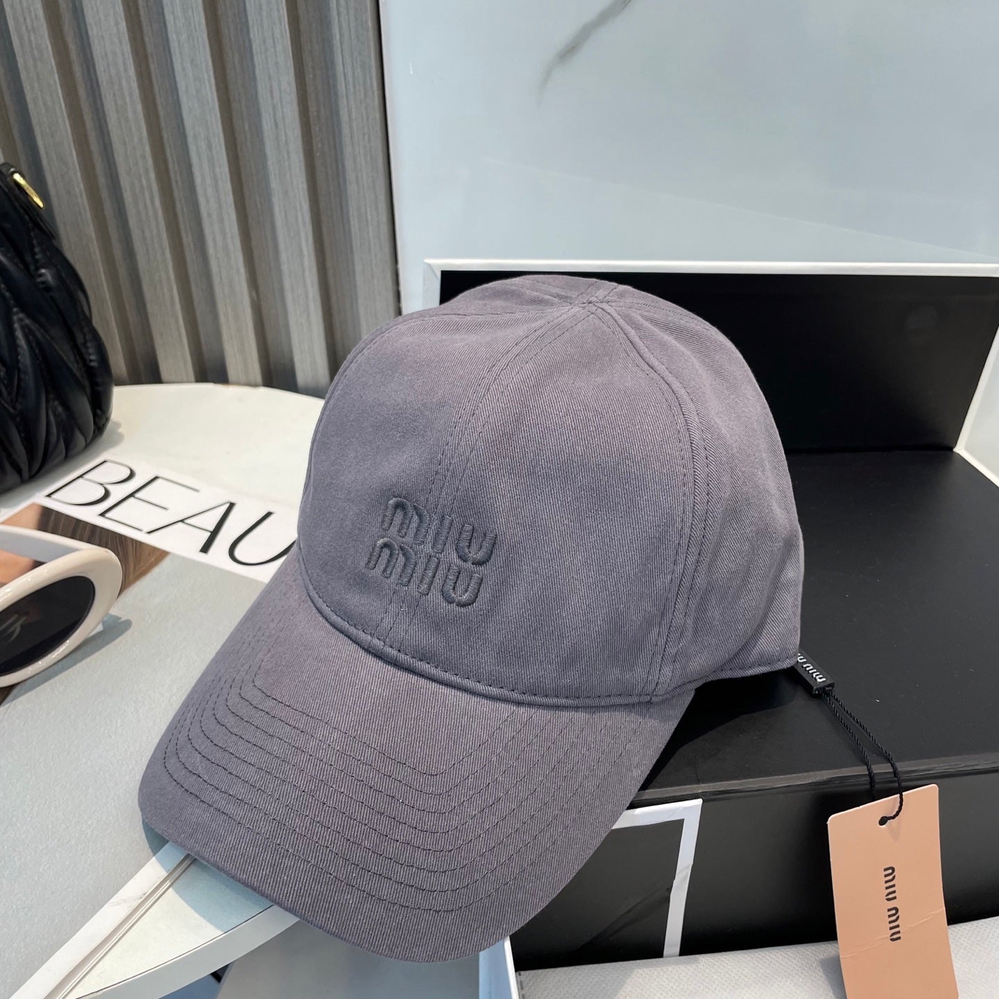 MM BASEBALL CAP IN GREY ORANGE FABRIC BRAND EMBROIDERY