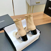CHANEL 25S HEELED CHAIN BOOTS WITH BOW IN BEIGE CALFSKIN GOLD HARDWARE