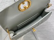 MONTAIGNE AVENUE MINI 19 BAG IN PISTACHIO GREEN CALFSKIN WITH GOLD HARDWARE