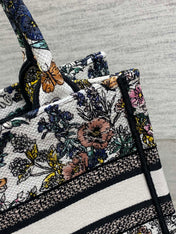 DIOR 25S LUCKY SMALL DIOR BOOK TOTE 26 IN MULTICOLOR DIOR FLOWERS CALENDAR ALLOVER EMBROIDERY