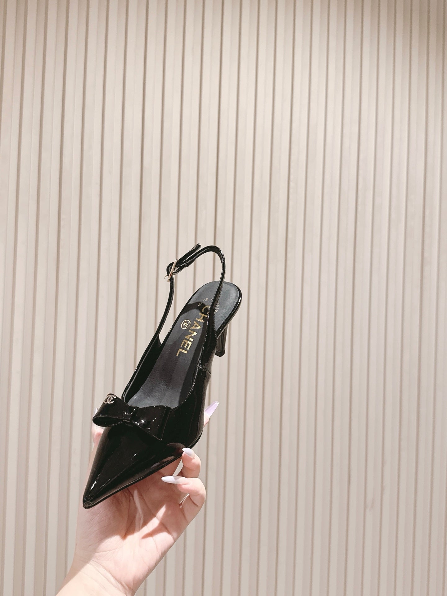 CC HIGH SLINGBACK IN BLACK LAMBSKIN WITH BOW ATTACHED
