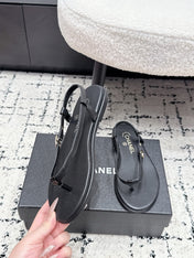 CHANEL 26S THONG SANDALS IN BLACK CALFSKIN WITH GOLD HARDWARE