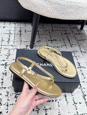 CHANEL 26S THONG SANDALS IN GOLD CALFSKIN WITH GOLD HARDWARE