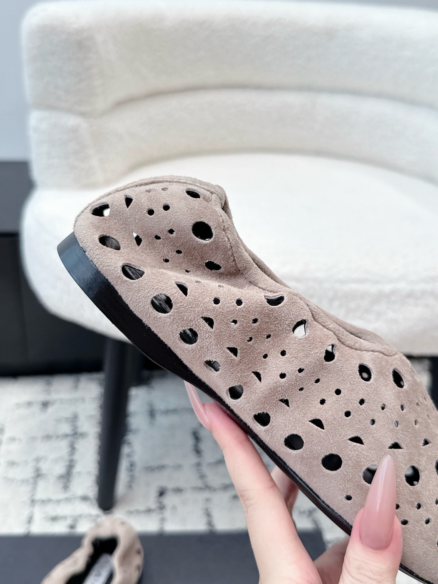 ALAIA 26S FLAT SLIP-ONS IN NUDE PINK SUEDE WITH OPENWORK PATTERN