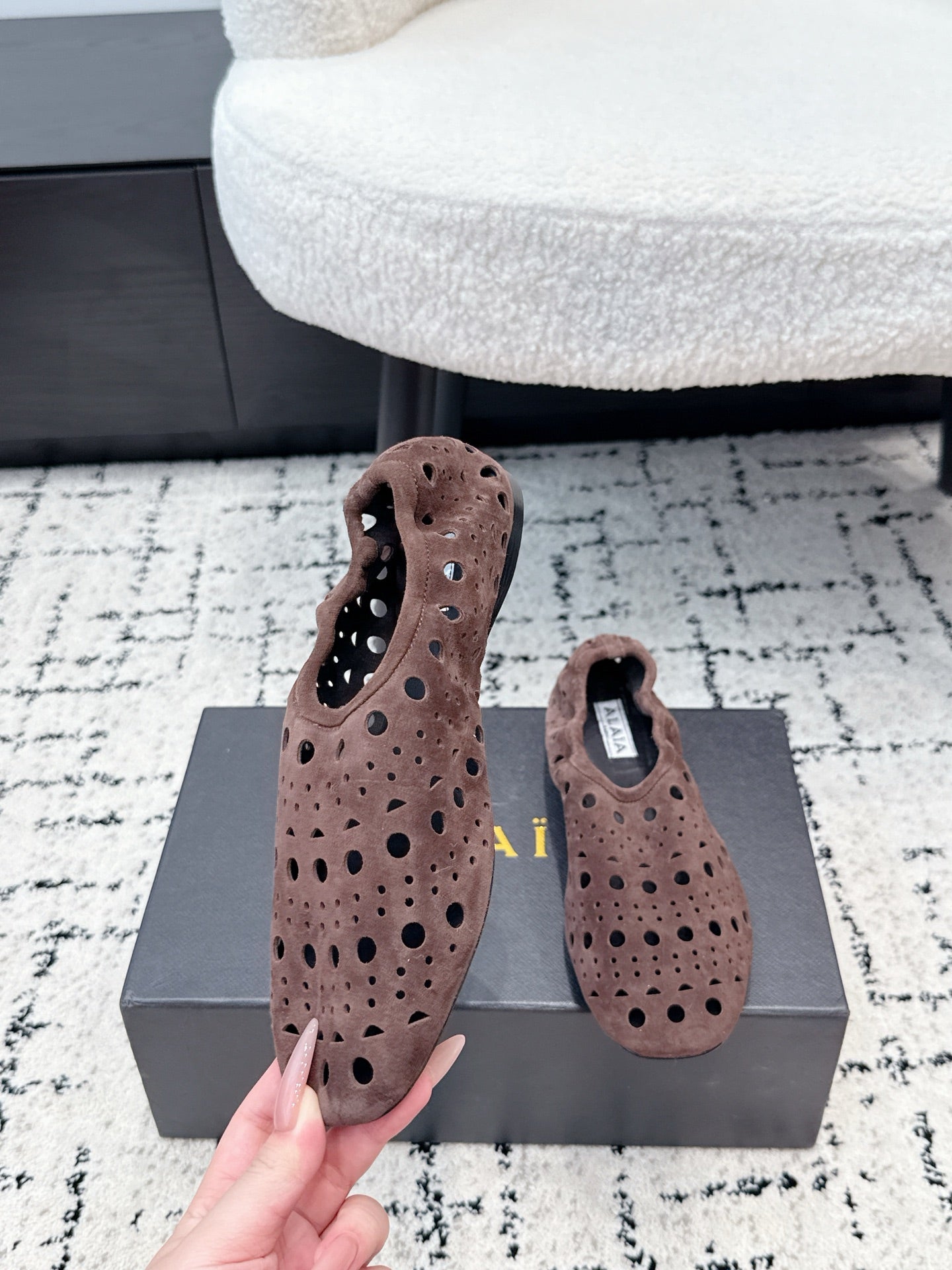 ALAIA 26S FLAT SLIP-ONS IN DARK BROWN SUEDE WITH OPENWORK PATTERN