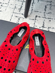 ALAIA 26S FLAT SLIP-ONS IN RED SUEDE WITH OPENWORK PATTERN