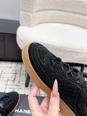 CHANEL 26S QUILTED SNEAKERS IN BLACK SUEDE