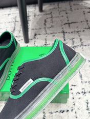 BOTTEGA VENETA 26S SNEAKERS IN BLACK AND GREEN CANVAS