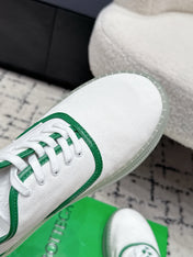 BOTTEGA VENETA 26S SNEAKERS IN WHITE AND GREEN CANVAS