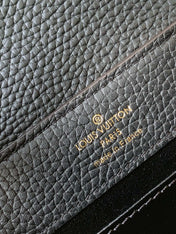 CAPUCINES MM BAG 21 IN BLACK TAURILLON COWHIDE GOLD HARDWARE