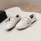 PRADA 26S LACE UP MINIMAL SNEAKERS IN WHITE CANVAS