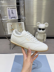 PRADA 26S LACE UP SNEAKERS IN WHITE CALFSKIN