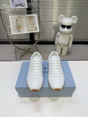 PRADA 26S LACE UP SNEAKERS IN WHITE CALFSKIN
