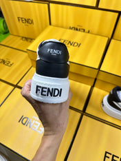 FENDI THICK-SOLDED SNEAKER IN WHITE AND BLACK LAMBSKIN