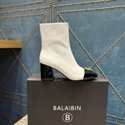 BALMAIN 26S BOOTS 65 MM IN WHITE AND BLACK CALFSKIN