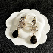 CHANEL 26S DOUBLE C LOGO CRYSTAL & BROWWN TEARDROP DANGLE EARRINGS IN GOLD METAL 629180