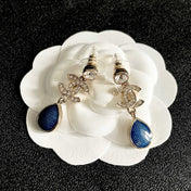 CHANEL 26S DOUBLE C CRYSTAL LOGO BLUE TEXTURED TEARDROP DANGLE EARRINGS IN GOLD METAL 629183
