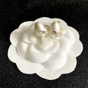 CHANEL 26S TEXTURED HEART CC LOGO STUD EARRINGS IN GOLD METAL 629191