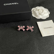 CHANEL 26S PINK ENAMEL BOW CRYSTAL STUD EARRINGS IN BLACK METAL 629977