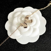 CHANEL 26S CRYSTAL BOW CHAIN BRACELET IN GOLD METAL 629980