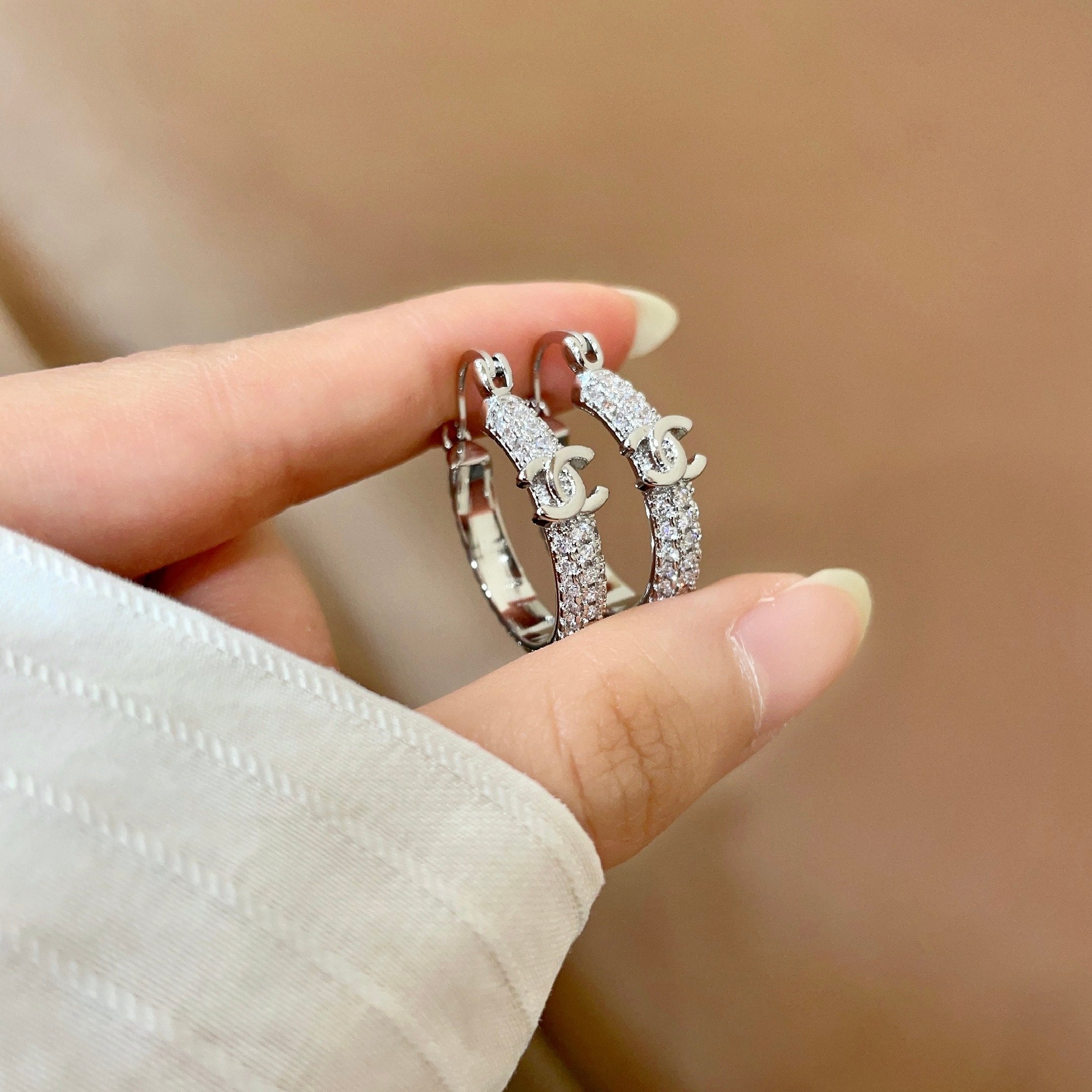 CHANEL 26S DOUBLE C LOGO FULL PAVE CRYSTAL HOOP EARRINGS IN SILVER METAL 630069