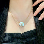 CHANEL 26S DOUBLE C LOGO WHITE ENAMEL CRYSTAL BALL PENDANT NECKLACE IN GOLD METAL 629889