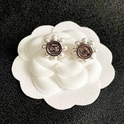 CHANEL 26S DOUBLE C LOGO PEARL TRIM ROUND STUD EARRINGS IN SILVER METAL 631020