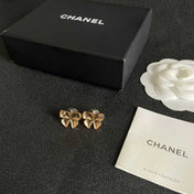 CHANEL 26S FOUR PETAL FLOWER STUD EARRINGS IN GOLD METAL 631031