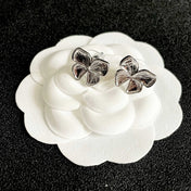 CHANEL 26S FOUR PETAL FLOWER STUD EARRINGS IN SILVER METAL 631032
