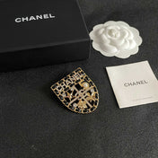 CHANEL 26S NUMBER SHIELD BROOCH WITH MULTI-CRYSTAL DETAIL IN GOLD METAL 631042