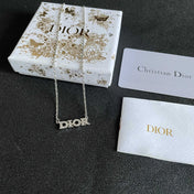 CD 26S PAVE LOGO LETTER NECKLACE IN SILVER TONE METAL 631805