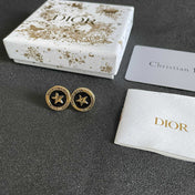 CD 26S STAR MEDALLION LOGO STUD EARRINGS IN BLACK ENAMEL & GOLD TONE METAL 631813