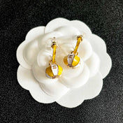 CHANEL 26S DOUBLE C LOGO BALL DROP EARRINGS IN YELLOW AND WHITE ENAMEL WITH GOLD METAL 631904