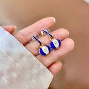 CHANEL 26S DOUBLE C LOGO BALL DROP EARRINGS IN BLUE AND WHITE ENAMEL WITH GOLD METAL 631905